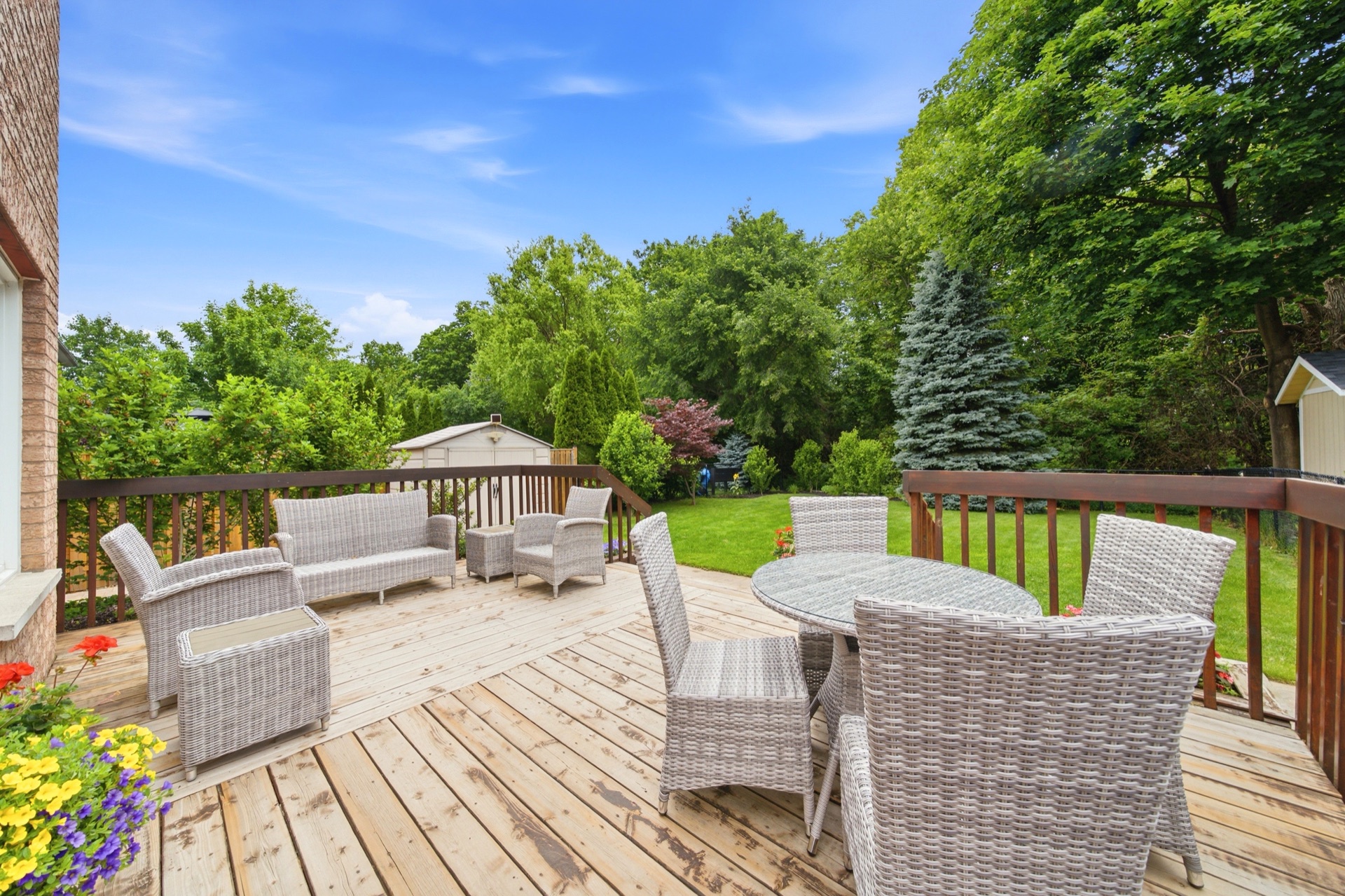 Large deck at 7287 Waldorf Way overlooking the backyard