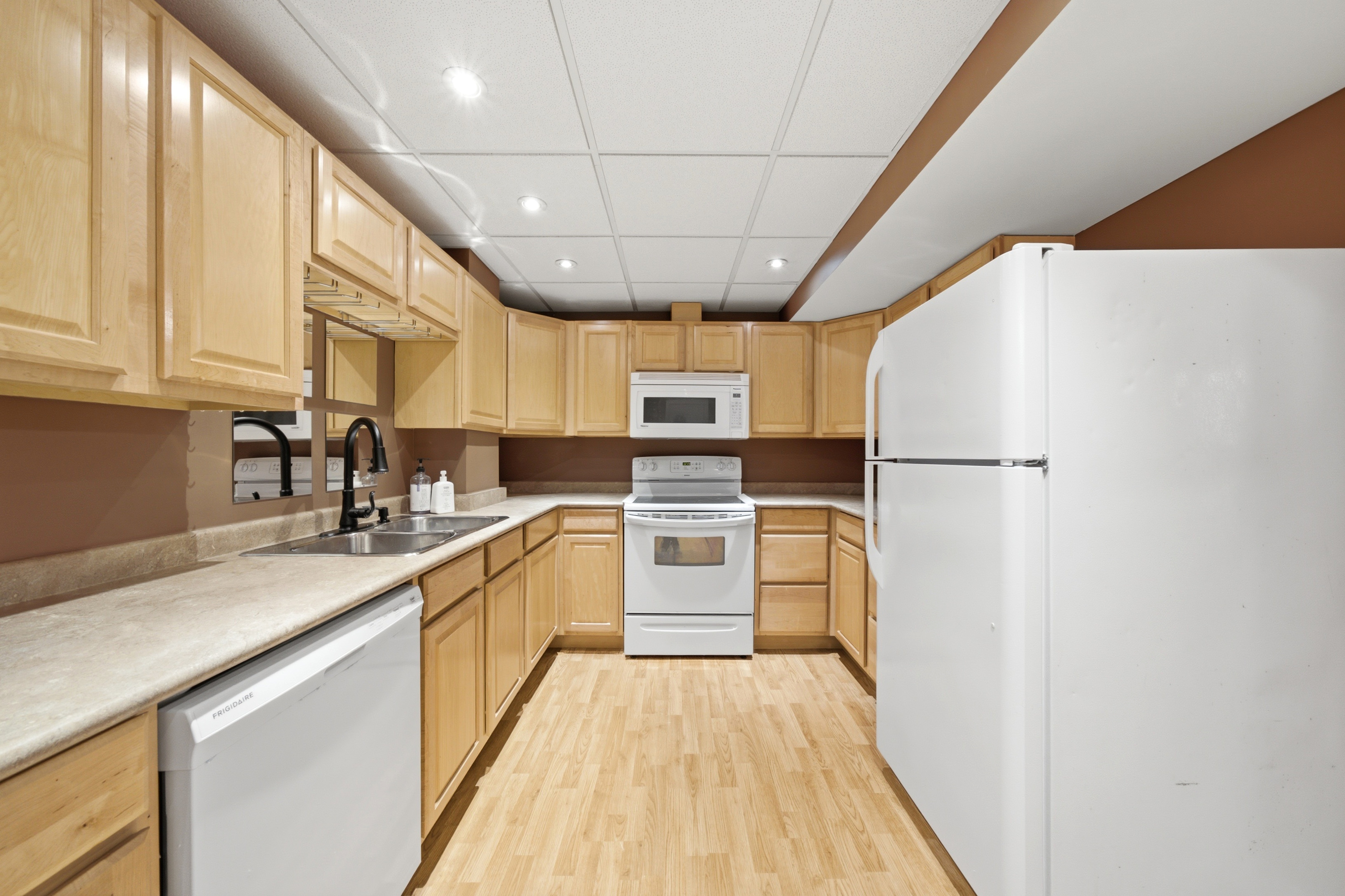 Lower level kitchen at 7287 Waldorf Way